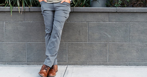 Front view of Outdoor Vitals Satu Adventure Pants worn in a casual setting.