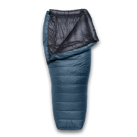 A down sleeping bag shown flat on a white background, with the front folded back to reveal a dark interior lining and a blue outer shell.